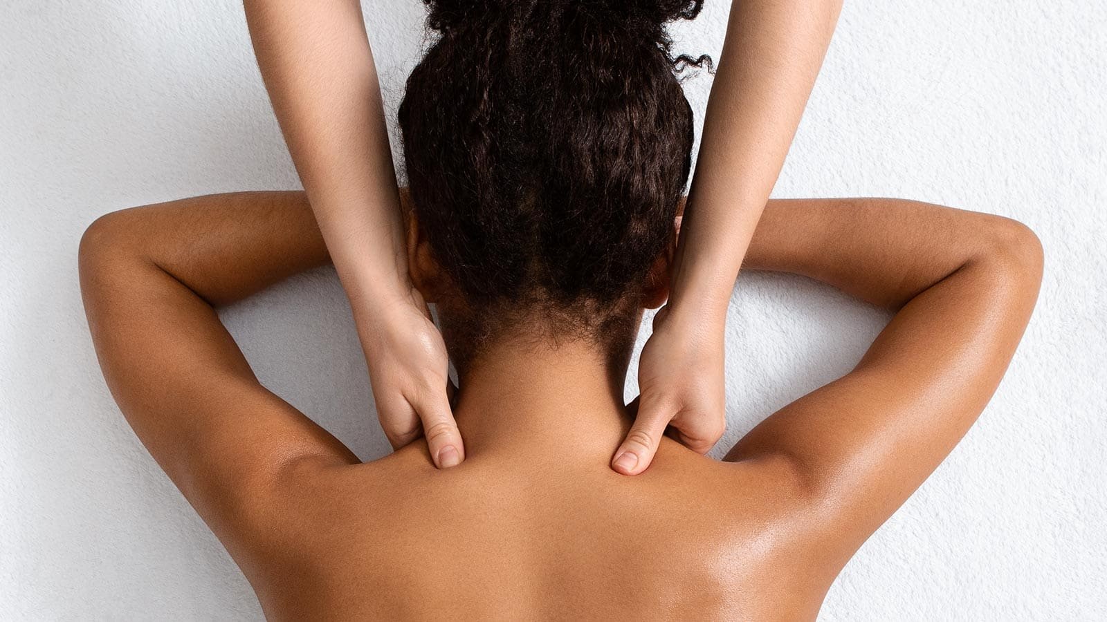 RMT treating shoulder tension in Surrey